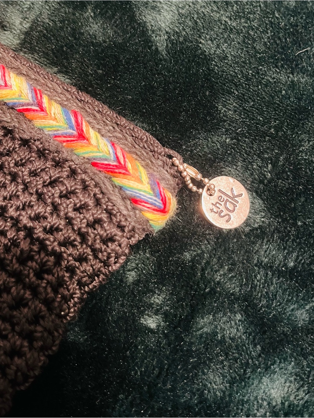 The Sak Crochet Wristlet Pouch in Black with Rainbow Trim